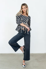 Jerzey Floral Peplum Blouse in Black - FINAL SALE